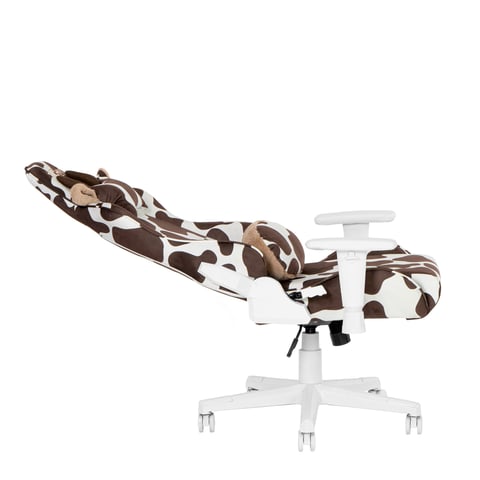 Brown and white camouflage gaming chair with white base and armrests, shown in reclined position