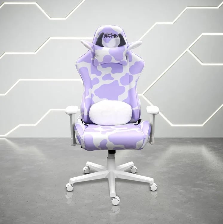 Purple and white gaming chair with cow spot pattern on geometric background